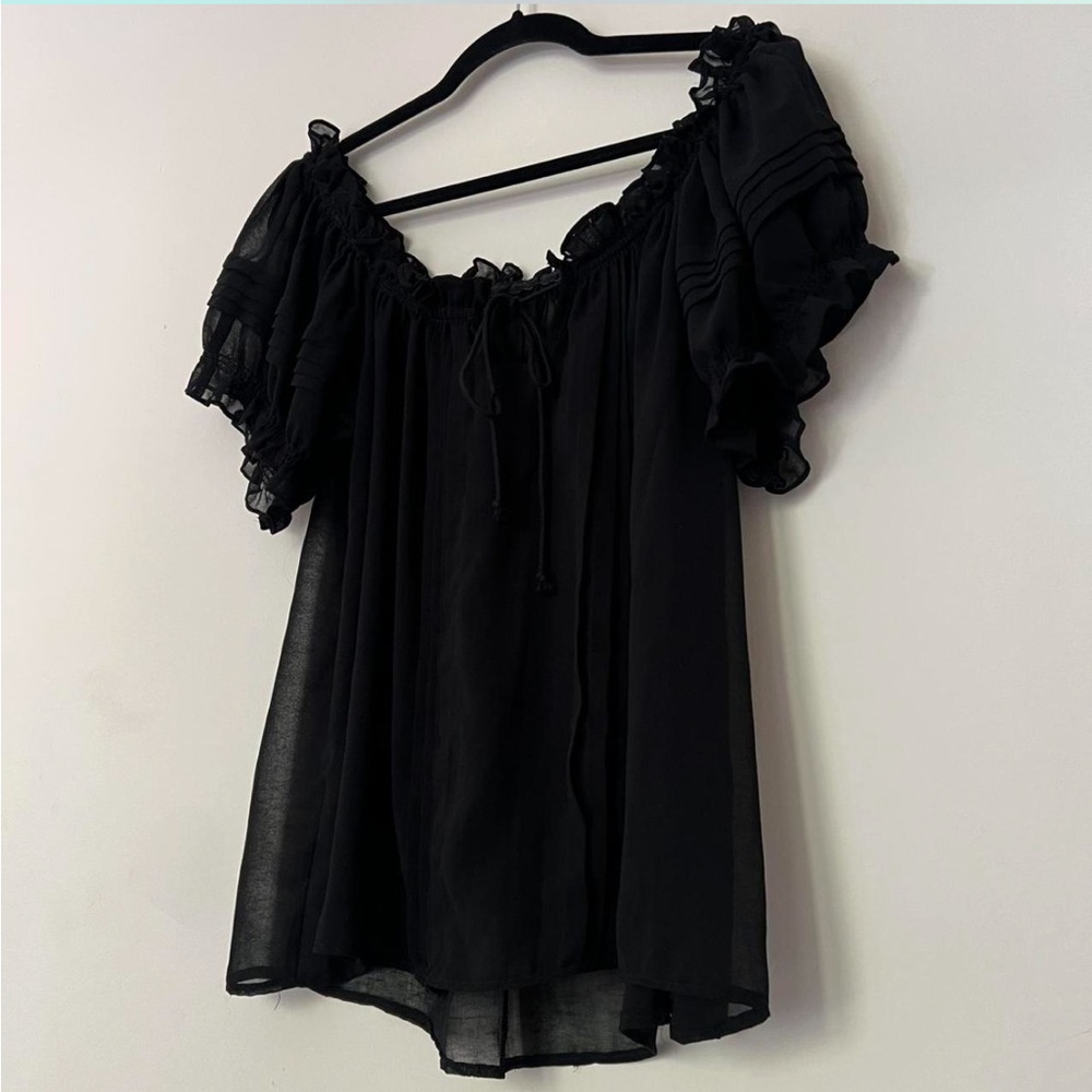 Black sheer off the shoulder ruffle top